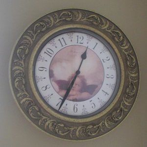 Cherub Clock – Raphael Angel